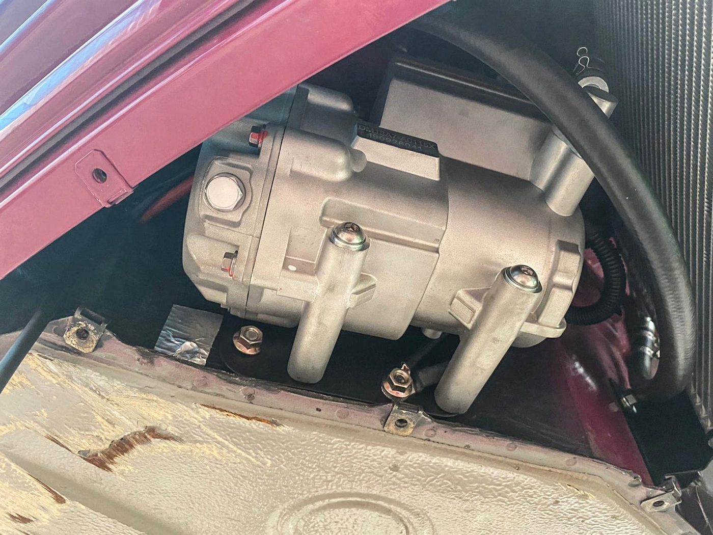 Electric A/C compressor mounted in a 964 front trunk