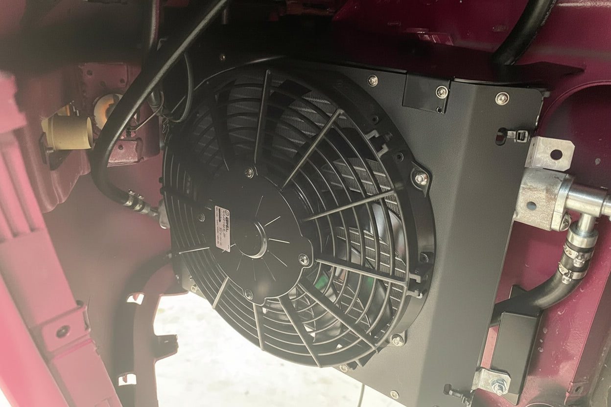 Condenser and fan mounted in a 964 front wheel arch
