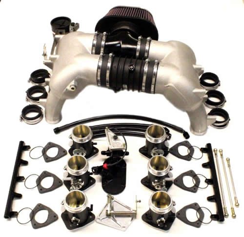 Rothsport big-bore ITB kit laid out: GT3-pattern twin plenums with cone filter, six throttle bodies, fuel rails, linkage and regulator