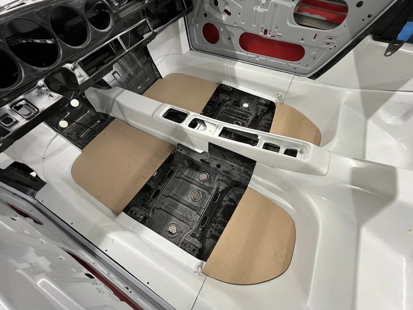 Stuttgart Classica floor boards fitted in a bare 911 shell with a smooth tub